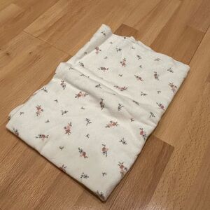 Carters large cotton swaddle blanket with a floral pattern